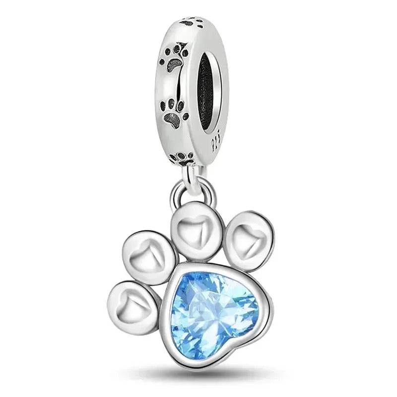 Pfotenliebe Charm – Hundepfote mit blauem Herzstein
