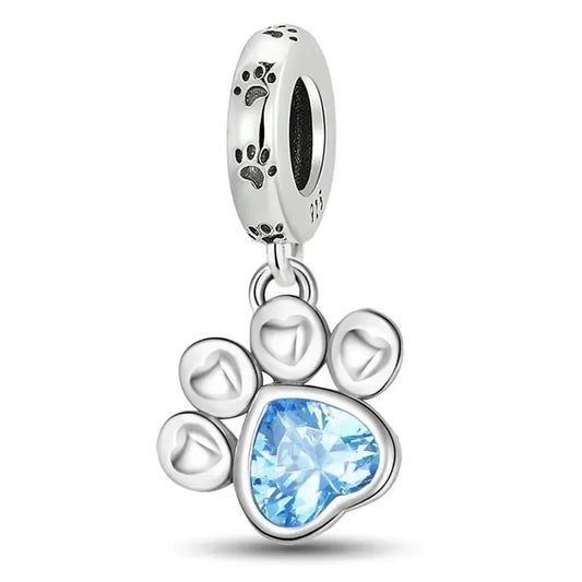 Pfotenliebe Charm – Hundepfote mit blauem Herzstein